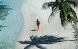 Woman on a beach in the Seychelles