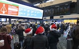 Christmas travellers at Euston station in London